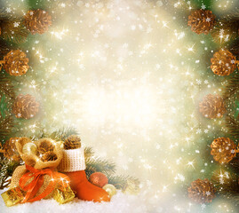 Christmas frame background with decorative Santa's red boot and gift bag, branch and pine cones for tree decoraton. New Year winter holidays fantasy concept with decor and copy space, festive postcard