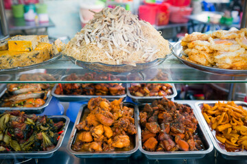Delicious Vietnamese street food selection in Ho Chi Minh City Vietnam evening market