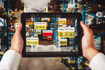 Smart warehouse management system using augmented reality technology to identify package picking and delivery . Future concept of supply chain and logistic business .
