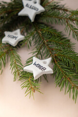 Christmas star with word WONDER White air dry clay for making decor to Christmas tree holiday. Creating hobby recreation activity that involves fingers. DIY crafting Modern art 