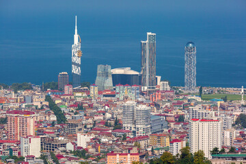 Fototapeta premium Panoramic view of Batumi city with modern towers and Black Sea coastline in Batumi Georgia