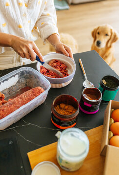 Cutting raw barf food for dog with supplements