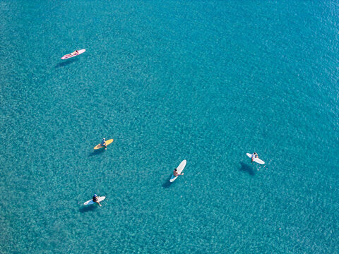 Aerial View Surfers Crystal Clear Turquoise Ocean Water