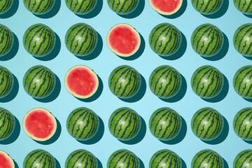 A colorful, repeating pattern features whole and sliced