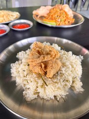 lime leaf rice and crispy chicken pieces