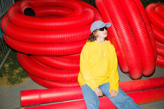 A strange portrait of a girl near unusual objects