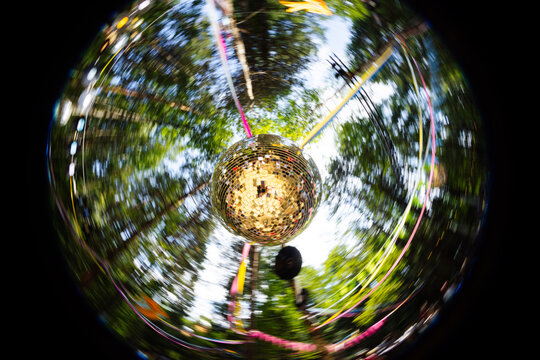 Shiny disco ball on music fest