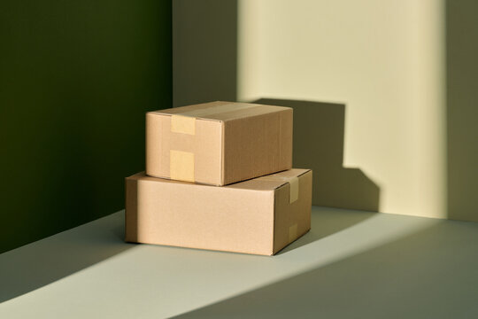 Two cardboard boxes are presented as gifts, perfect for special event