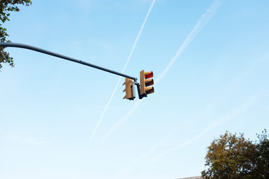 Modern traffic lights and clear blue sky in urban city environment
