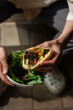 Falafel pita wrap with fresh salad