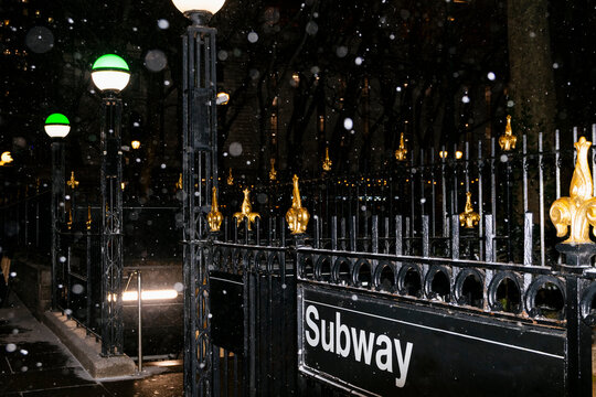Subway entrance during winter snowstorm