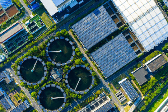 Aerial view of wastewater treatment plant with circular tanks