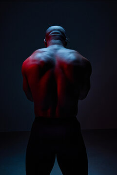Strength and determination showcased in dramatic lighting