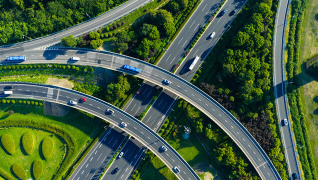 Aerial view of highway interchange with curved ramp