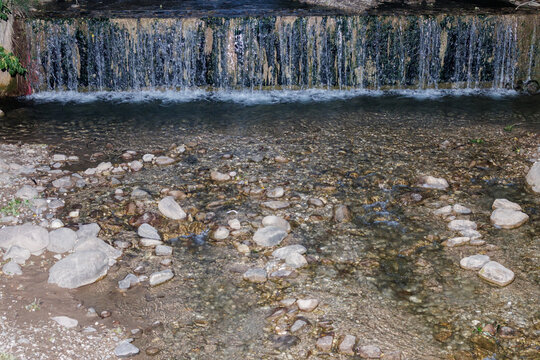 A stream flows through the mountain landscape