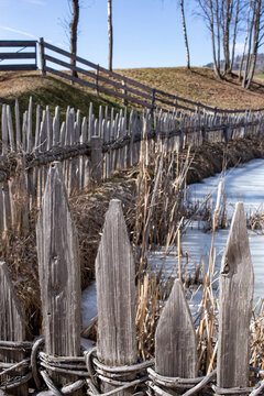 Woven fence slats in the mountains
