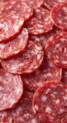 Obraz premium Closeup of Fresh Sliced Salami - Perfect for Deli and Charcuterie Boards