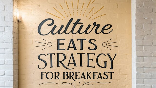 Inspirational Wall Art Quote on Culture, Strategy, and Breakfast in Modern Cafe Setting