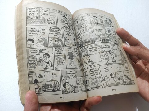 close up of an opened a Japanese doraemon comic book