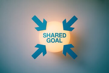 Four blue arrows pointing towards a glowing orb with Shared Goal text on a light background pointing inward