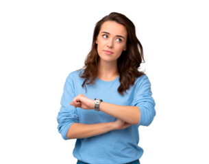 Young female in blue sweater checking time with thoughtful expression