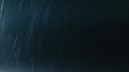 Dark Rainy Night Sky with Streaks of Light.