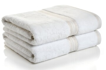 Stack of two white cotton towels isolated on white background