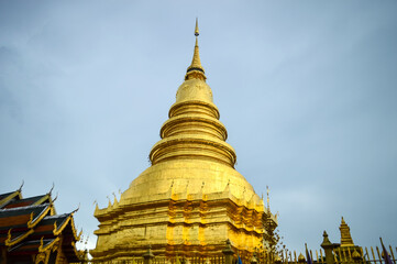 Pagoda and Chapel, Lanna Architecture, Symbols of Buddhism, South East Asia at Wat Phra That Hariphunchai, Lamphun, Northern Thailand