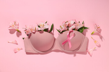 Bra arranged with flowers and pink ribbon promoting awareness