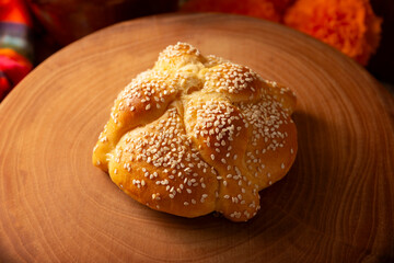 Pan de Muerto. Typical Mexican sweet bread that is consumed in the season of the day of the dead. It is a main element in the altars and offerings in the festivity of the day of the dead.
