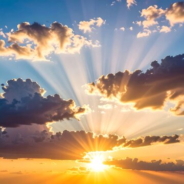 Dramatic Sunlight Bursting Through Cumulus Clouds in Sunset Sky