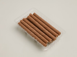 Biscuit sticks or rolled biscuits on white background