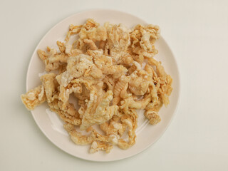 Chicken feet crackers on white background