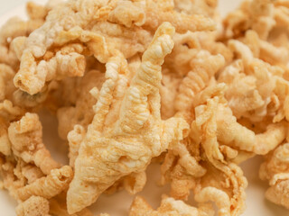Chicken feet crackers on white background
