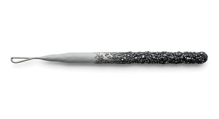Close-up of a silver-colored tool with a loop on one end and a textured handle.