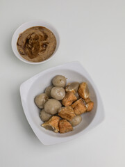 Meatballs and meatball tofu on white bowl