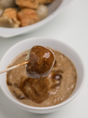 Meatballs and meatball tofu on white bowl