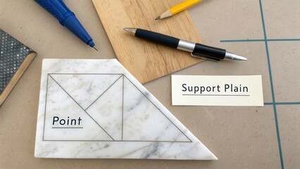 Geometric Shapes and Writing Tools on Table for Design and Planning Activities in Bright Workspace Environment