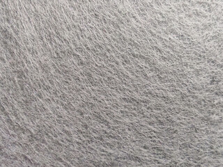 Fine Detailed Close-Up of Grey Non-Woven Felt Fabric Textile Texture for Background and Design