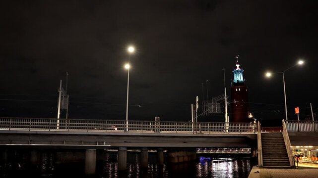 Stockholm, Sweden A night view with traffic of Centralbron, the Central Bridge, and the City Hall from Klara Malarstrand in downtown. 