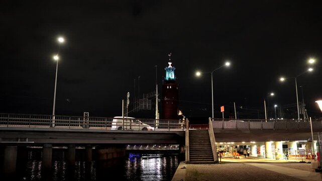Stockholm, Sweden A night view with traffic of Centralbron, the Central Bridge, and the City Hall from Klara Malarstrand in downtown. 