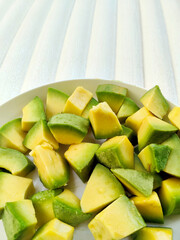 Bright Studio Shot Showcasing the Rich Texture and Color of Freshly Cubed Avocado
