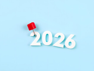 2026 Highlighted with Red Pushpin on Light Blue Background