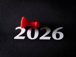 Bold 2026 Typography with Red Pushpin on Black Background