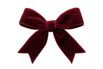 Red velvet bow creating holiday gift decoration