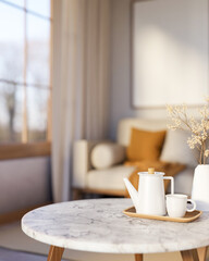 Teapot and cup on wooden tray and flower vase over round marble table across sofa in a living room.