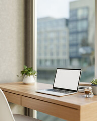White screen laptop and coffee aside potted plant on wooden desk with cityscape outside glass wall.