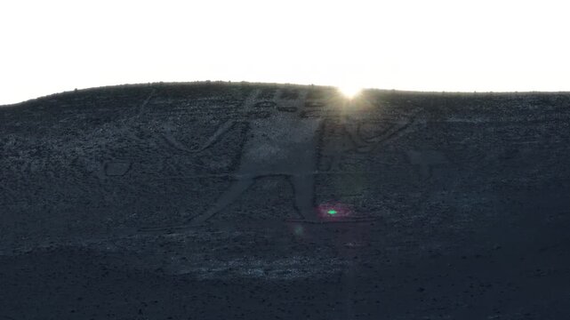 Giant of Tarapaca geoglyph seen from above in the vast Chilean desert terrain