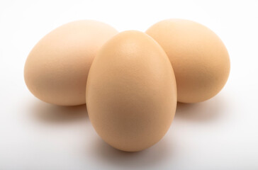 Fresh chicken eggs on white background