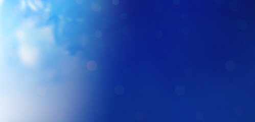 Abstract blue bokeh sky . abstract blue sky background with blurry bokeh light effect. great for...